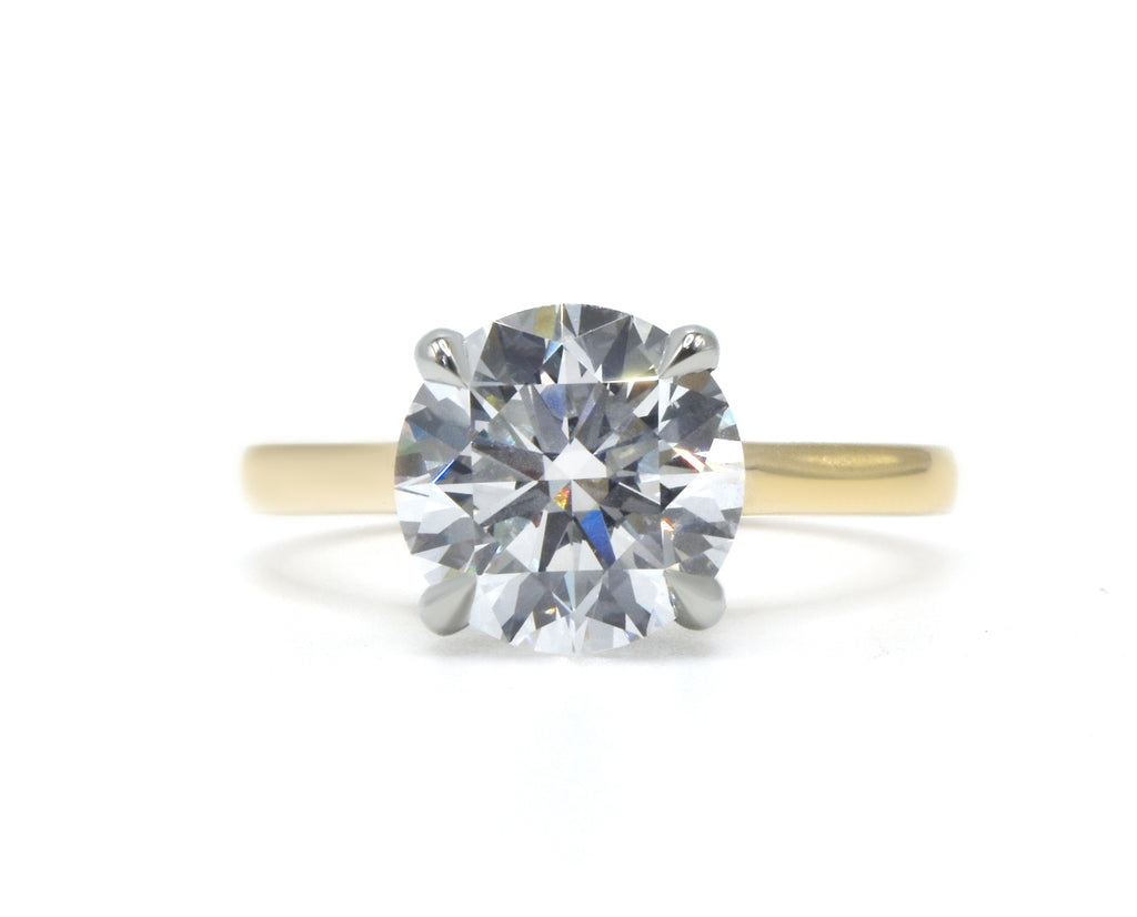 Round Brilliant Two-Tone Solitaire with Diamond Bridge & Hidden Halo