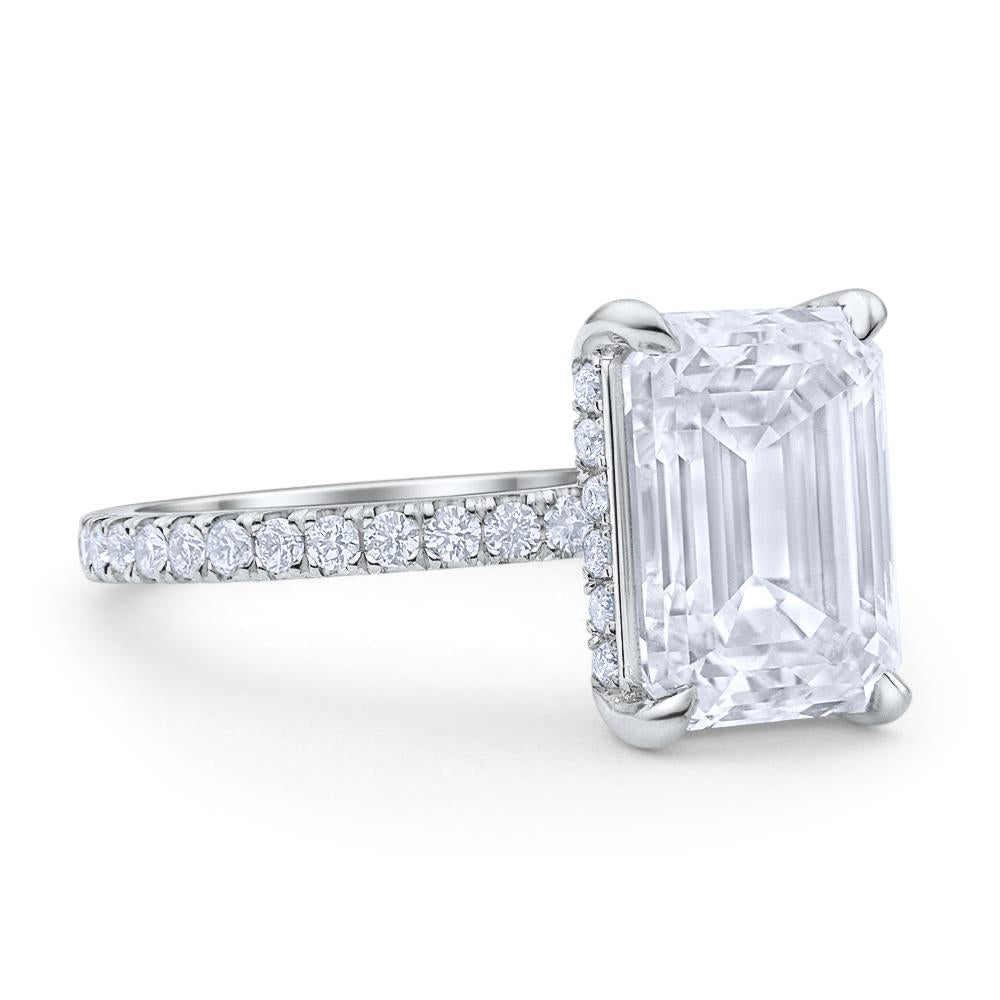 Floating emerald discount cut engagement ring