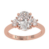 Two-Tone Oval Cut Diamond Three Stone Engagement Ring