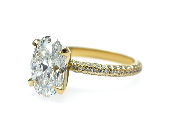 Oval Brilliant Cut Diamond Halo Three Row Pavé