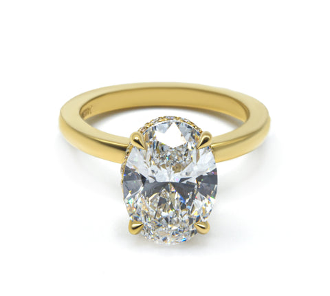 Exquisite Oval Cut Diamond Solitaire with Hidden Halo