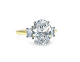 Two-Tone Oval Cut Diamond Three Stone Engagement Ring