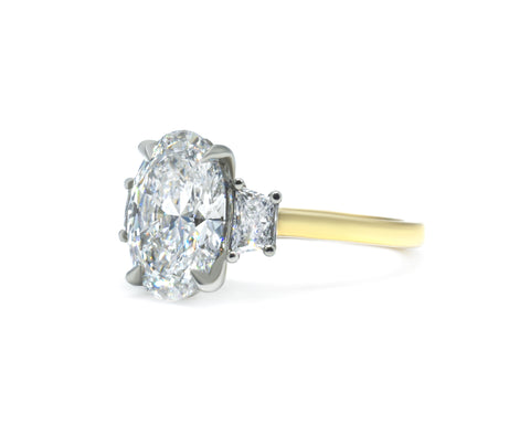 Two-Tone Oval Cut Diamond Three Stone Engagement Ring