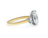 Two-Tone Oval Cut Diamond Three Stone Engagement Ring