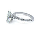 Sparkling Oval Cut Diamond Ring with Pave Band