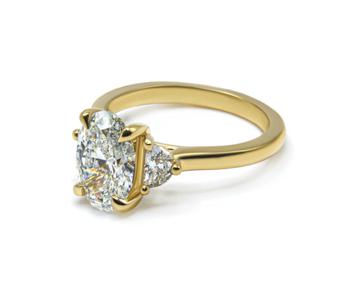 Timeless Elegance: Oval Cut Diamond Ring with Half Moon Side Stones