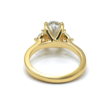 Timeless Elegance: Oval Cut Diamond Ring with Half Moon Side Stones