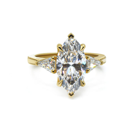 Marquise cut Three Stone Engagement Ring