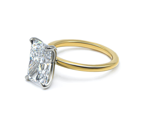 Clean and Simple Basket Radiant cut Diamond Solitaire Ring