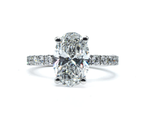 Oval Cut Diamond Ring with Pave Band