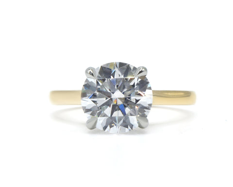 Round Brilliant Two-Tone Solitaire with Diamond Bridge & Hidden Halo