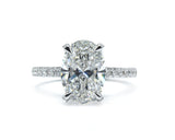 Oval Cut Diamond Ring with Pave Band and Hidden Halo