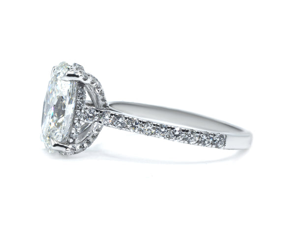Oval Cut Diamond Ring with Pave Band and Hidden Halo