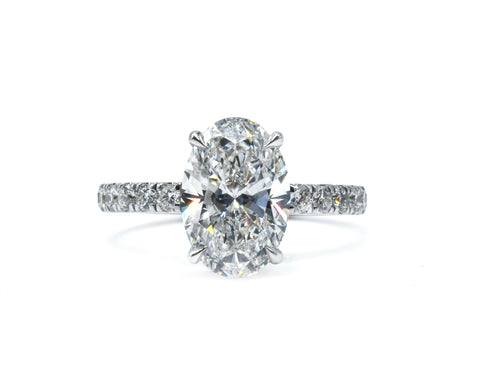 Classic Oval Engagement Ring with Diamond Band
