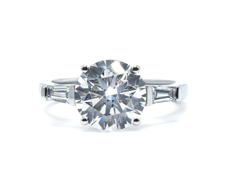 Round cut and Tapered Baguette Lab-Grown Diamond Three-Stone Engagement Ring