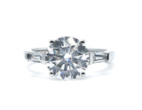 Round cut and Tapered Baguette Lab-Grown Diamond Three-Stone Engagement Ring