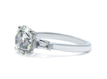 Round cut and Tapered Baguette Lab-Grown Diamond Three-Stone Engagement Ring