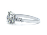 Round cut and Tapered Baguette Lab-Grown Diamond Three-Stone Engagement Ring