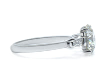 Round cut and Tapered Baguette Lab-Grown Diamond Three-Stone Engagement Ring