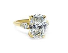 Harmonious Trio: Oval & Pear Lab-Grown Diamonds Engagement Ring