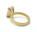 Emerald Cut Solitaire Ring with a Flat Band