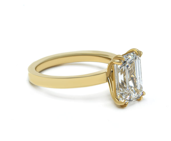 Emerald Cut Solitaire Ring with a Flat Band