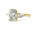 Elegant Three-Stone Cushion and Pear Lab-Grown Diamond Ring