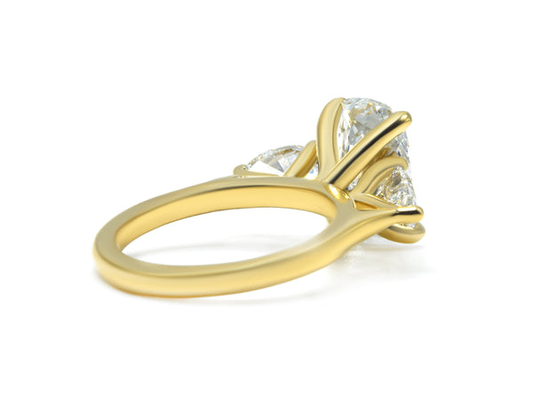 Elegant Three-Stone Cushion and Pear Lab-Grown Diamond Ring