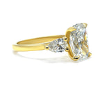 Elegant Three-Stone Cushion and Pear Lab-Grown Diamond Ring