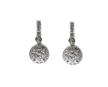 1.30 + carat Ideal Cut Round Brilliant Cut Lab Grown Diamond Earrings, set in the halo.