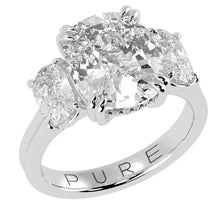 Three stone cushion cut diamond engagement ring