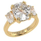 Three stone cushion cut diamond engagement ring