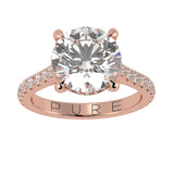 Cathedral Hidden Halo Elongated Round Cut Diamond, French Cut Pavé sides