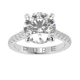 Cathedral Hidden Halo Elongated Round Cut Diamond, French Cut Pavé sides