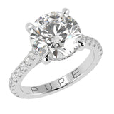 Cathedral Hidden Halo Elongated Round Cut Diamond, French Cut Pavé sides