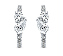 0.75 + carat Ideal Cut Round Brilliant + Pear Shape Cut Lab Grown Diamond Earrings, set in the halo.