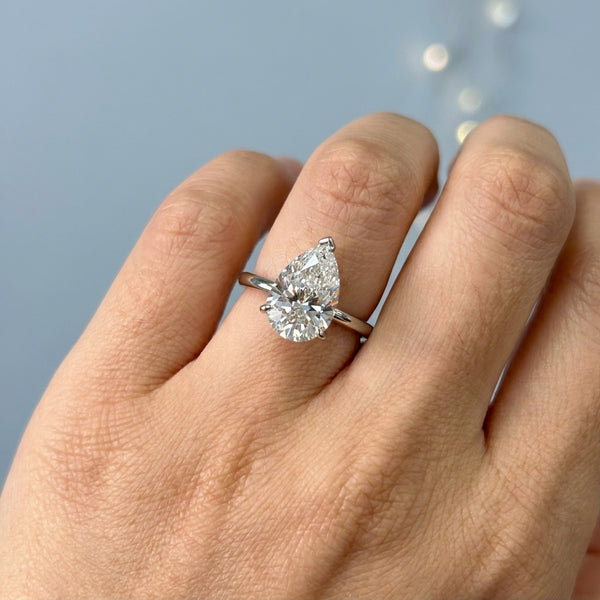 Hand model shot of the white gold engagement ring
