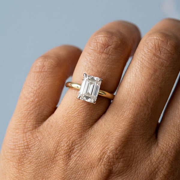 Hand model shot of the yellow gold engagement ring