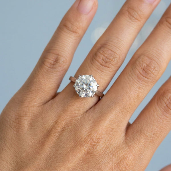 Hand model shot of the white gold engagement ring