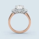 Two-Tone Oval Cut Diamond Three Stone Engagement Ring