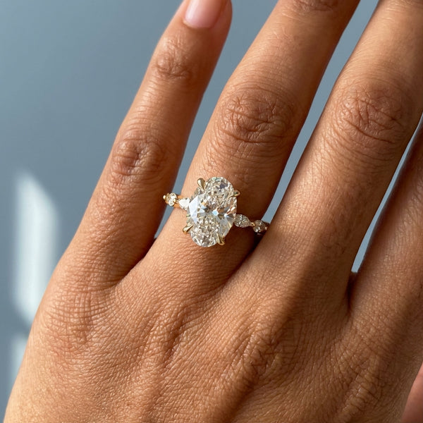 Hand model shot of the yellow gold engagement ring