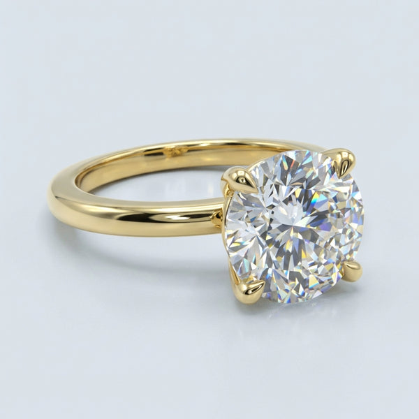 Front view of the yellow gold engagement ring