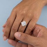 Two-Tone Oval Cut Diamond Three Stone Engagement Ring