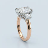 Two-Tone Oval Cut Diamond Three Stone Engagement Ring