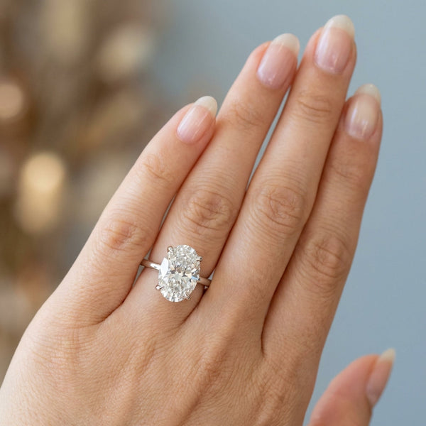 Oval Hidden-Halo Lab-Grown Diamond Ring in white gold — worn on a hand