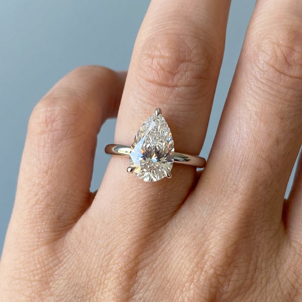 Hand model shot of the white gold engagement ring