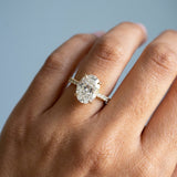 Sparkling Oval Cut Diamond Ring with Pave Band