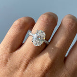 Sparkling Oval Cut Diamond Ring with Pave Band