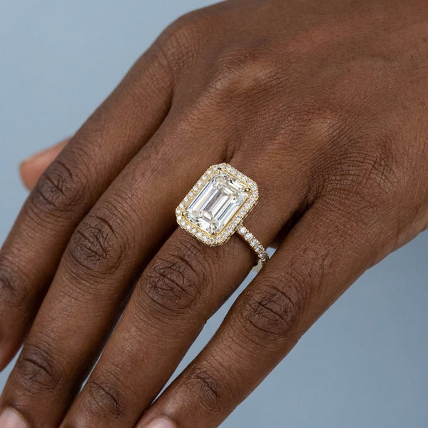 Hand model shot of the yellow gold engagement ring