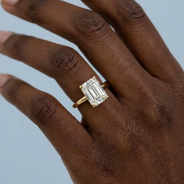 Hand model shot of the yellow gold engagement ring